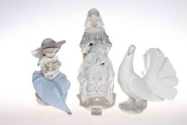 Three Lladro figures, lady sewing,
