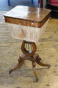 Early 19th Century mahogany sewing table raised on lyre support to four scrolled legs, 43cm by 75.