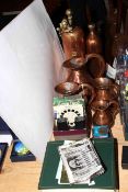 Copper measures, sprayer and bottle, stamp album, postcards,