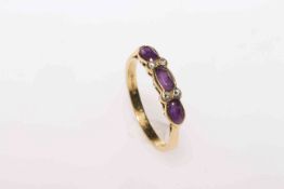 Amethyst and diamond ring on 18 carat yellow gold shank