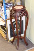 Oriental hardwood and marble inset jardiniere stand,