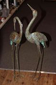 Two bronze effect models of herons