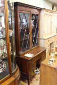 Edwardian mahogany and string inlaid bookcase-writing desk having two astragal glazed doors above a