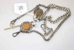 Two silver watch chains with fobs