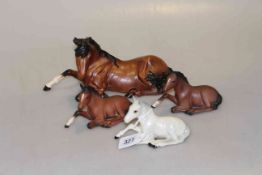 Four Beswick reclining horses
