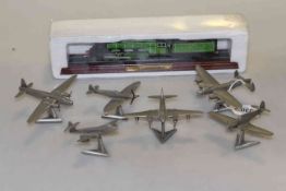 Six Royal Hampshire pewter model military aeroplanes,