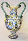 Majolica vase, distressed, with serpent handles, indistinct underglaze blue mark to base,