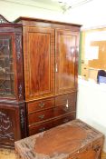 Edwardian inlaid mahogany press having two panelled doors above two short and two long drawers