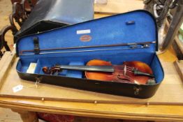 Cased violin and bow