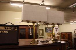 Two brass candelabra style table lamps and shades