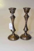 Pair of silver candlesticks, weighted,