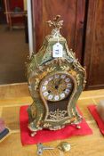 Ornate baluster shape clock with inlay and gilt metal mounts