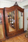 French oak arched top double mirror door armoire