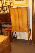 Continental mahogany two door cocktail cabinet and nest of three spider leg tables (2)