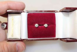 Pair of gold and diamond stud earrings