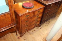 Period style burr walnut serpentine front chest of two short above three long drawers on bracket