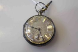 Silver open-face pocket watch with key