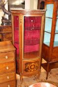 Continental inlaid and ormolu mounted bow front single door vitrine,