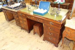 Bradley Furniture mahogany pedestal partners desk having nine drawers to front with three faux