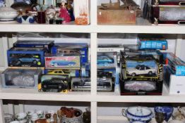 Collection of boxed model vehicles including Revell, Kid Connection,