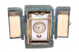 Early 20th Century brass and mother-of-pearl miniature carriage clock, in a fitted case,