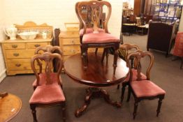 Victorian mahogany oval snap top breakfast table and six Victorian mahogany spear back dining