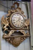 Ornate gilt wall clock,