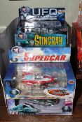 Seven boxed Diecast Metal action models including Stingray