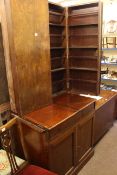 Late Victorian mahogany cupboard with shelved top and doors