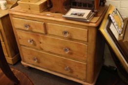 Late Victorian pine three height chest with glass handles