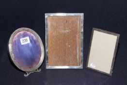 Three silver picture frames