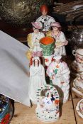 Collection of seven Staffordshire figures including General Gordon