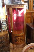 Continental inlaid and ormolu mounted bow front single door vitrine