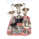 Four silver trophy cups, silver goblet and a silver plate,