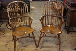 Pair of Windsor pierced splat back elbow chairs with crinoline stretchers