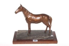 Patinated metal model of a horse