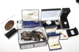 Group of watches including Longines, plaque,