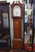 Inlaid oak cased eight day longcase clock with painted arch dial by Stonehouse,