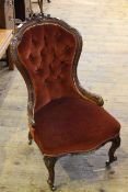 Victorian carved mahogany framed nursing chair on carved cabriole legs
