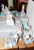 Collection of nine Lladro figures