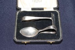 Silver pusher and spoon,