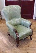 Victorian mahogany upholstered armchair in green floral fabric