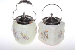 Two biscuit barrels of Burmese glass type