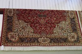 Red ground Keshan carpet 2.30 by 1.