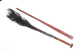 Leather covered swordstick and a fly swat (2)