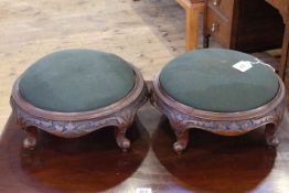 Pair of Victorian circular carved walnut footstools