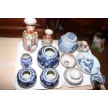 Two trays of Chinese porcelain including 18th Century saucers