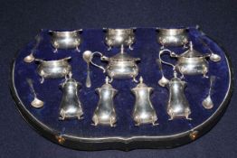 Good George V silver cruet set, Birmingham 1920, comprising four salts,