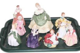 Eight Royal Doulton figures and a Coalport figure