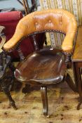 Tan buttoned leather Captains style swivel desk chair